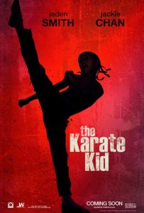 The poster for The Karate Kid with Jaden Smith performing a high kick