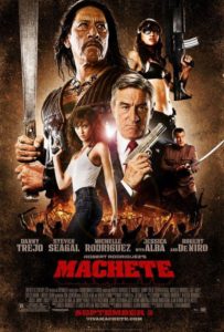 The poster for the movie Machete with all of the characters in the foreground holding weapons with the character Machete in the background holding a machete