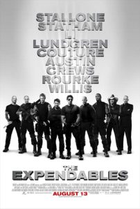 The poster for the movie The Expendables that's black and white with all of the action stars sending together and their names stacked on top of them