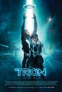 The poster for the movie Tron: Legacy, which mimics the original Tron poster with Garrett Hedlund and Olivia Wilde standing under a beam of line shooting through a disc.
