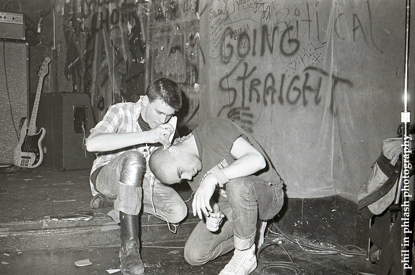 A guy shaves another guy's head in a still from the documentary All Ages: The Boston Hardcore Film
