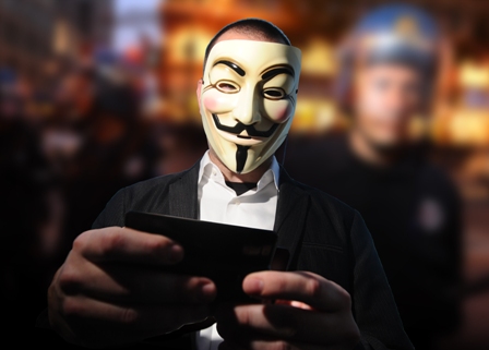 Anonymous member in Guy Fawkes mask from the documentary We Are Legion: The Story of Hacktivists