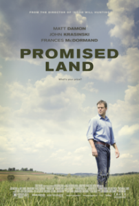 Poster for the movie Promised Land with Matt Damon standing in a field