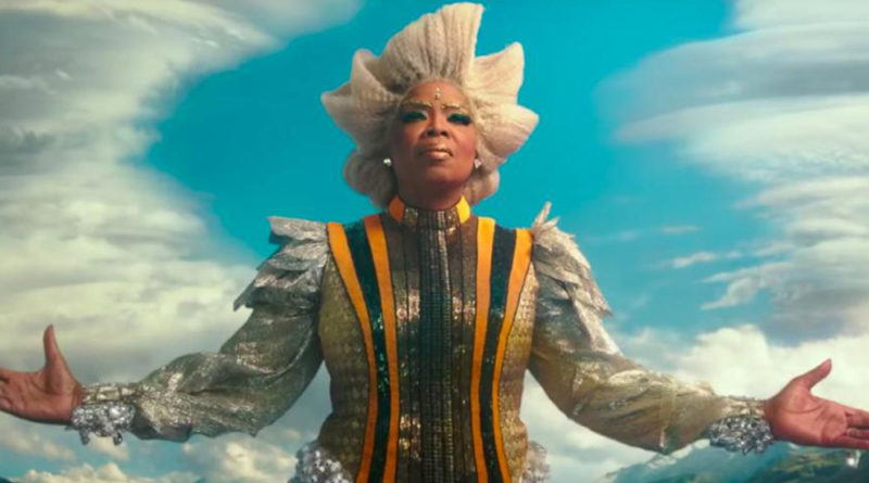 Oprah is large with arms wide open as her character in Ava DuVernay's A Wrinkle in Time.