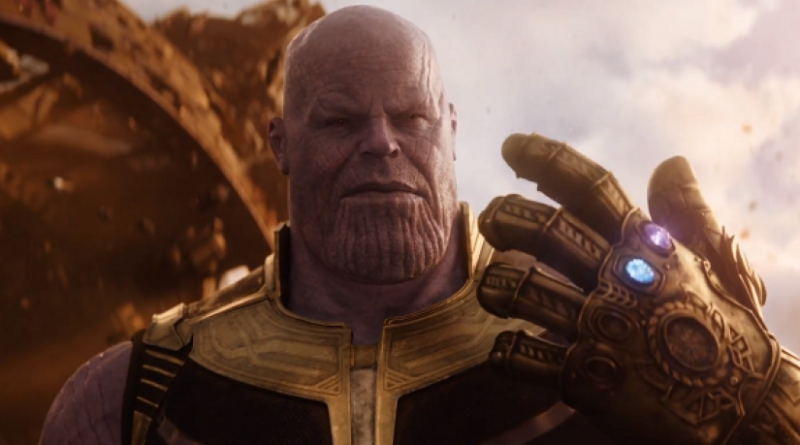 Thanos admires the infinity gauntlet on his hand in Avengers: Infinity War.