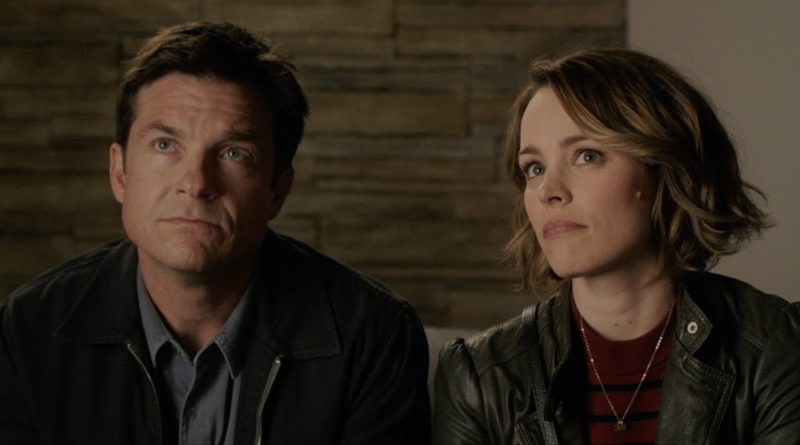 Jason Bateman and Rachel McAdams look skeptical in Game Night.
