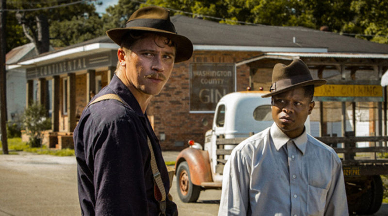 Garrett Hedlund and Jason Mitchell looking tensely back at the camera in Dee Rees' Mudbound.