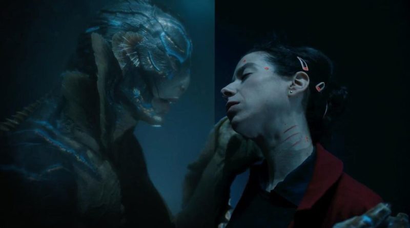 The fish creature in The Shape of Water cradles Sally Hawkins's face tenderly.
