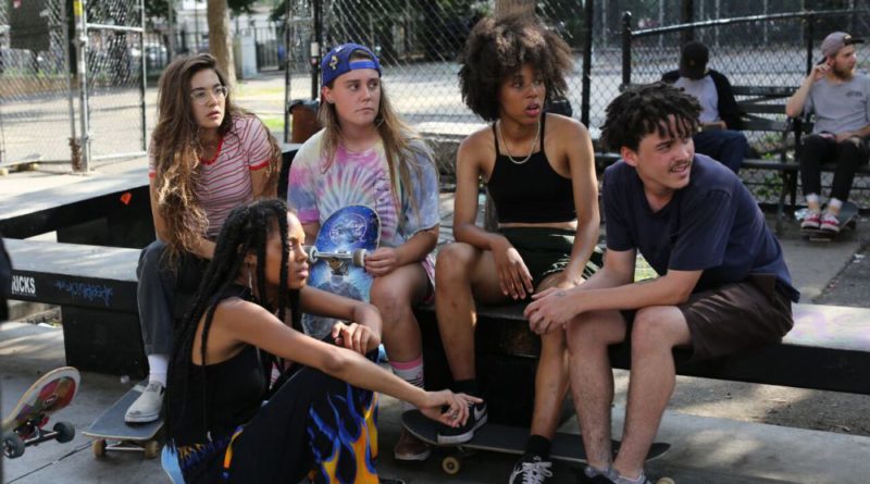 A group of young women hang out and skateboard in Skate Kitchen