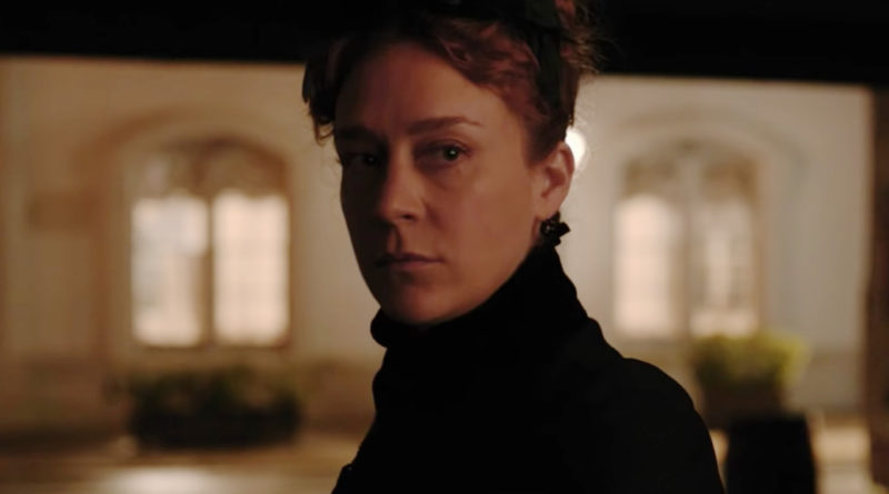 Chloe Sevigny in the movie Lizzie cast in shadow glaring at the camera