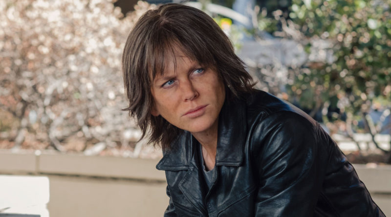 Nicole Kidman looking haggard in the movie Destroyer sitting and tilting her head toward the audience.