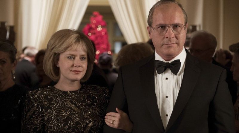 Amy Adams and Christian Bale in the movie Vice standing arm and arm as Lynne and Dick Cheney facing the camera
