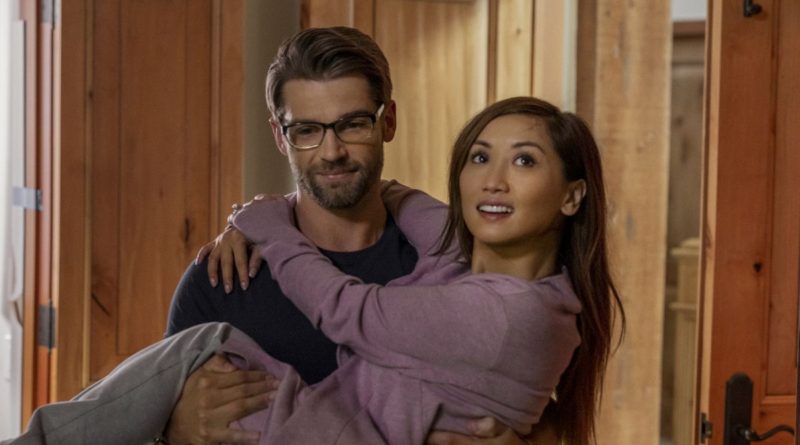 Mike Vogel carries Brenda Song in the movie Secret Obsession