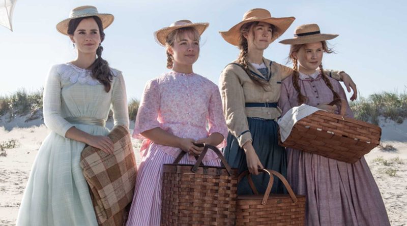 Emma Watson, Florence Pugh, Saoirse Ronan, and Eliza Scanlon stand on the beach together in the movie Little Women