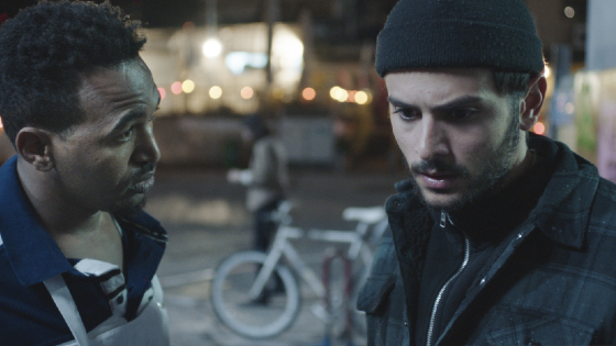 Dawit Tekleb looks imploringly at Daniel Gad in the short film White Eye.
