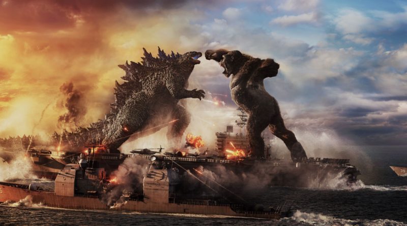 Godzilla and King Kong trade blows from passing battleships in the movie Godzilla vs Kong