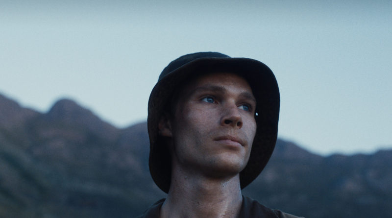 Kai Luke Brummer looks off into the distance as Nicholas in Oliver Hermanus’ MOFFIE